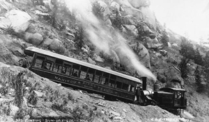 Early photo of the Cog Train at Son-of-a-Gun hill. Photo by J.G. Heistand, courtesy of the Special Collection Department at Pikes Peak Library.