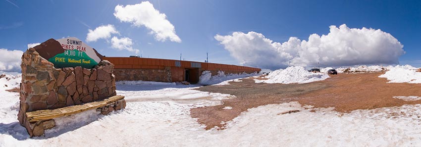 The west side of the Pikes Peak Summit House after late snow in May.